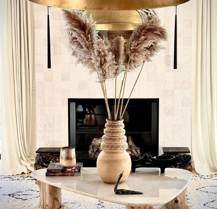 living room with gold and beige fixtures