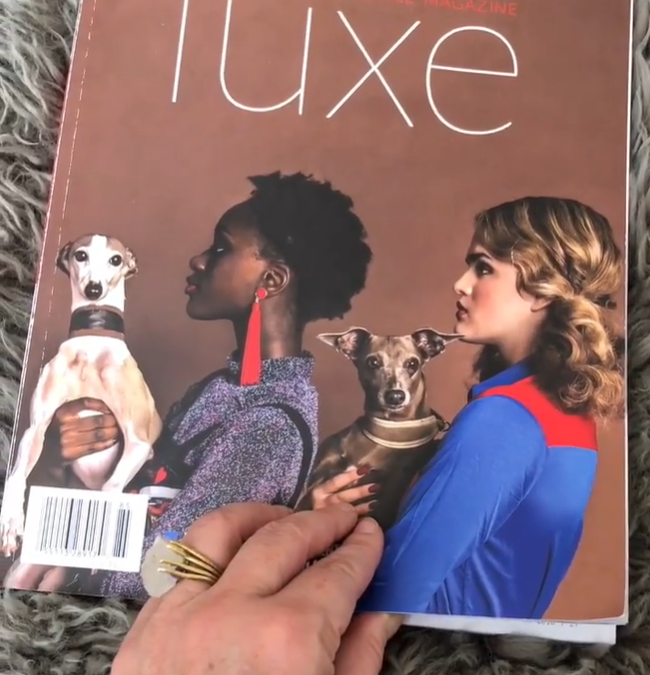 magazine cover of luxe magazine while henrietta holds the page