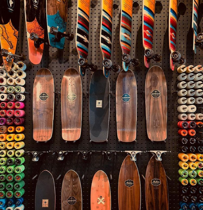 wall of colourful skateboards on venice beach